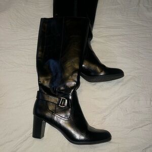 Beautiful black teal zip up leather boots